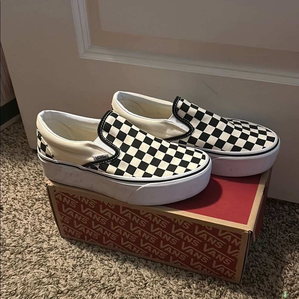 Vans Black and White Checkerboard Slip-Ons